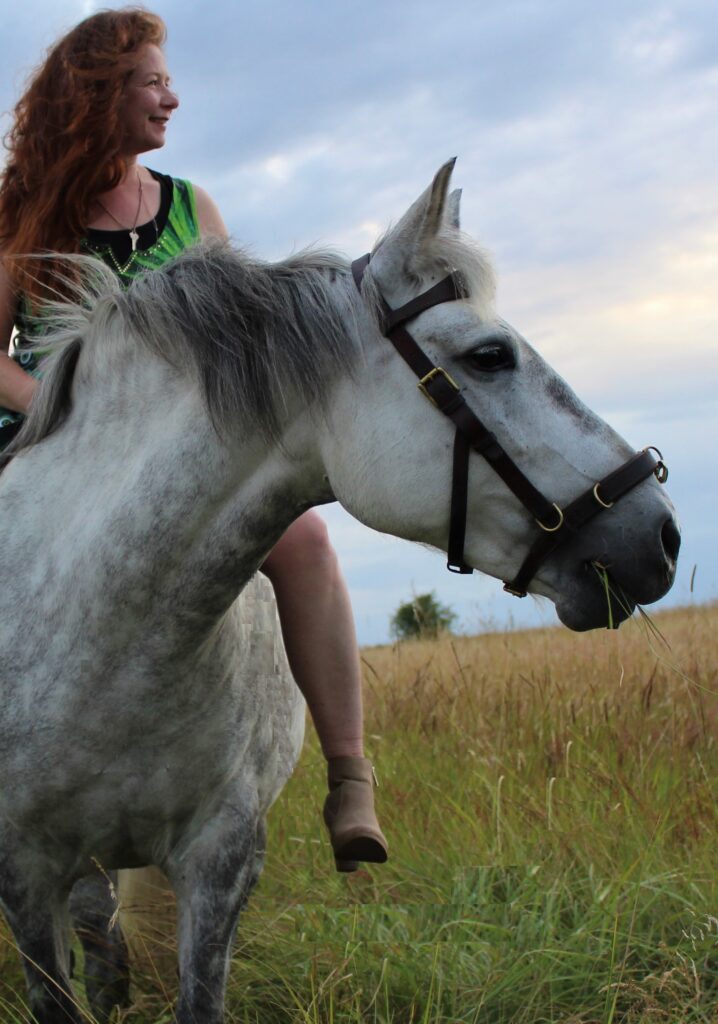 Sandra Poppema and her formerly wild horse Kyra